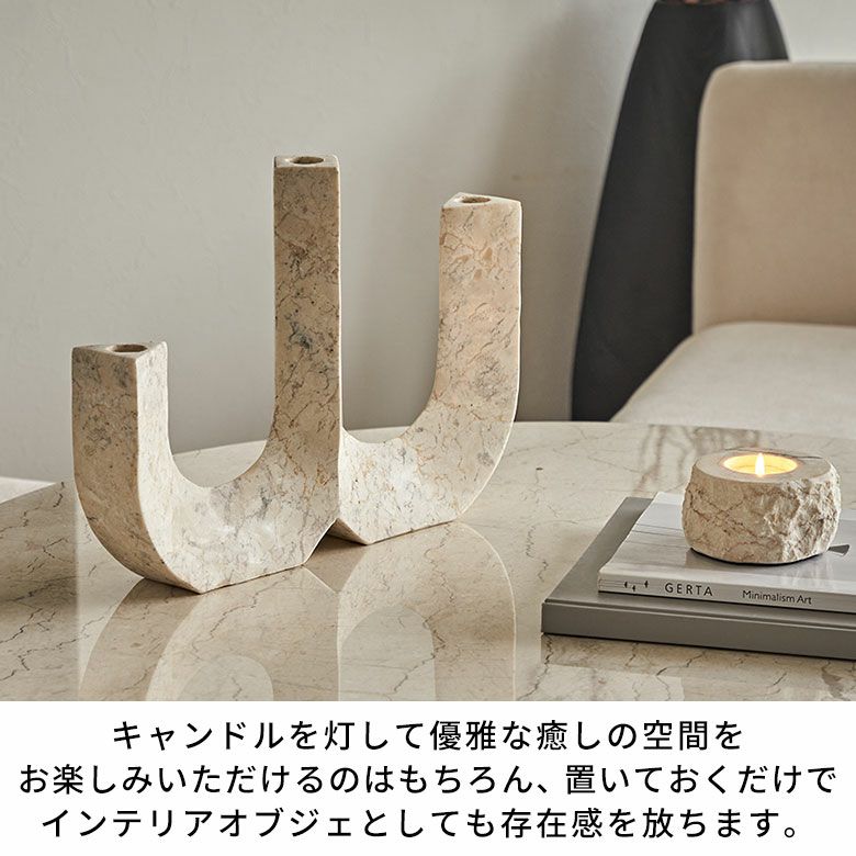 高級感溢れるアイボリー色の大理石を彫って作られた3連マーブル