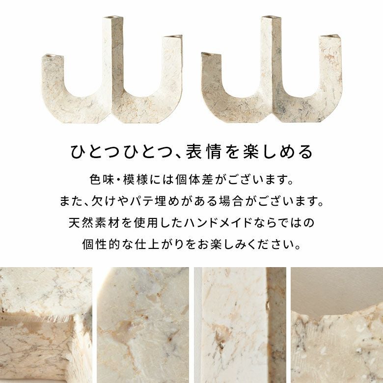 高級感溢れるアイボリー色の大理石を彫って作られた3連マーブル